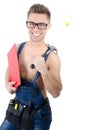 Young handsome handyman holding a hammer. Royalty Free Stock Photo