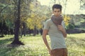 Attractive young handsome man, model of fashion in the park Royalty Free Stock Photo