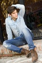 Attractive young handsome man, model of fashion in urban background Royalty Free Stock Photo