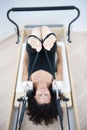 Attractive young lady doing pilates Royalty Free Stock Photo