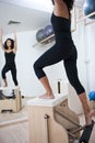 Attractive young lady doing pilates Royalty Free Stock Photo