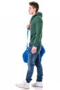 Attractive young man with bag on shoulder strap Royalty Free Stock Photo