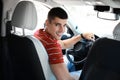 Attractive young man driving luxury car Royalty Free Stock Photo