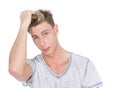 Attractive young man with hand in hair Royalty Free Stock Photo