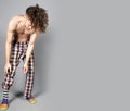 Young athletic ginger in pyjamas man studio portrait Royalty Free Stock Photo