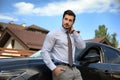 Attractive young man near luxury car Royalty Free Stock Photo
