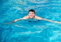 Attractive Young man in the pool Royalty Free Stock Photo