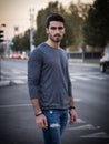 Attractive young man portrait at night with city lights