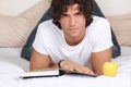 Attractive young man read a book