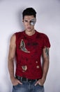 Attractive Young Man with Robotic Skin Art and Ripped T-Shirt