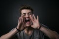 Attractive young man shouting out loud Royalty Free Stock Photo