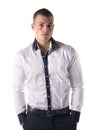 Attractive young man white shirt and blue pants Royalty Free Stock Photo