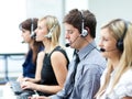 Attractive young man working in a call center Royalty Free Stock Photo