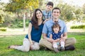 Attractive Young Mixed Race Family Portrait in the Park. Royalty Free Stock Photo