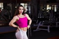 Attractive young muscular woman bodybuilder with perfect body po Royalty Free Stock Photo