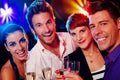 Attractive young people in nightclub Royalty Free Stock Photo