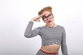 Attractive young pretty woman wearing casual clothes and nice glasses over wall Royalty Free Stock Photo