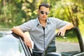 Attractive young serious man car Royalty Free Stock Photo