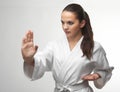 Attractive young women in a karate pose Royalty Free Stock Photo