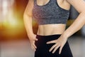 Young  woman in a gym  exercises Royalty Free Stock Photo