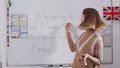 Teacher explaining grammar during online lesson in classroom Royalty Free Stock Photo