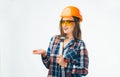 Attractive young woman in building helmet with hammer and orange protective glasses over the white background Royalty Free Stock Photo