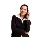 Attractive young woman calling by cellular phone. Royalty Free Stock Photo