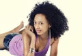 Attractive young woman with curtly frizzy long hair Royalty Free Stock Photo