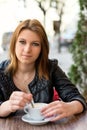 Attractive young woman drinking coffee latte Royalty Free Stock Photo