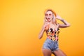 Attractive young woman drinking orange juice Royalty Free Stock Photo