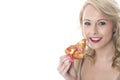 Attractive Young Woman Eating Pizza Slice Royalty Free Stock Photo