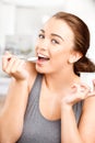 Attractive young woman eating yogurt Royalty Free Stock Photo