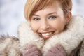Attractive young woman in fur coat Royalty Free Stock Photo