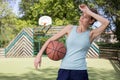 attractive young woman having basketball break Royalty Free Stock Photo