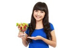 Attractive young woman holding fruit salad Royalty Free Stock Photo