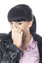 Attractive Young Woman Holding Her Nose From a Bad Smell Royalty Free Stock Photo