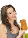 Attractive Young Woman Holding a Hot Cheese Slice Pastry