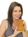 Attractive Young Woman Holding a Hot Cheese Slice Pastry