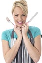 Attractive Young Woman Holding Knife and Fork Royalty Free Stock Photo