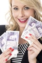 Attractive Young Woman Holding Money