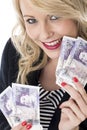 Attractive Young Woman Holding Money