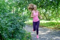 Attractive young woman jogging on park trail. healthy lifestyle concept Royalty Free Stock Photo