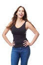 Attractive young woman laughing with hands on hips Royalty Free Stock Photo