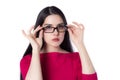 Attractive young woman in a pink blouse with glasses Royalty Free Stock Photo