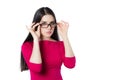 Attractive young woman in a pink blouse with glasses Royalty Free Stock Photo