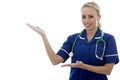 Attractive Young Woman Posing As A Doctor or Nurse Royalty Free Stock Photo