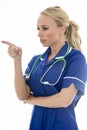 Attractive Young Woman Posing As A Doctor or Nurse Royalty Free Stock Photo