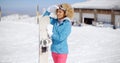 Attractive young woman posing at a ski resort Royalty Free Stock Photo