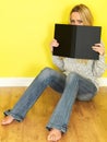 Attractive Young Woman Reading a Book