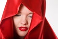 Attractive young woman in red hood Royalty Free Stock Photo